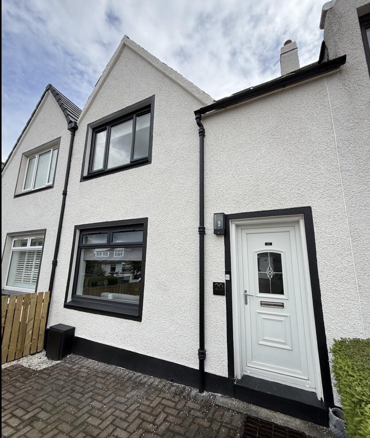 Finished white external rendering on a residential property